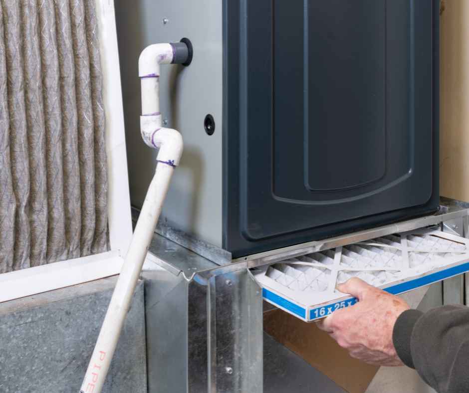 Replacing an air filter in a furnace in a home